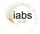 das Firmen-Logo der Unternehmensberatung IABS-Berlin in Neukölln. Der Name ist in Kleinbuchstaben schwarz dargestellt und passend zu Silvester/ Neujahr festlich mit goldenen Akzenten verziert.